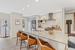 Breakfast bar at kitchen island with barstools for 4. 